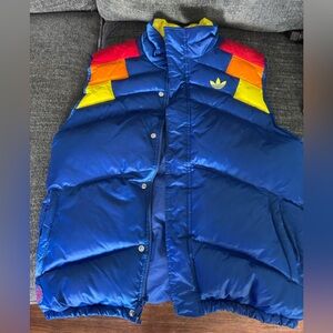 Adidas Blue Puffer Vest with Red and Yellow Accents